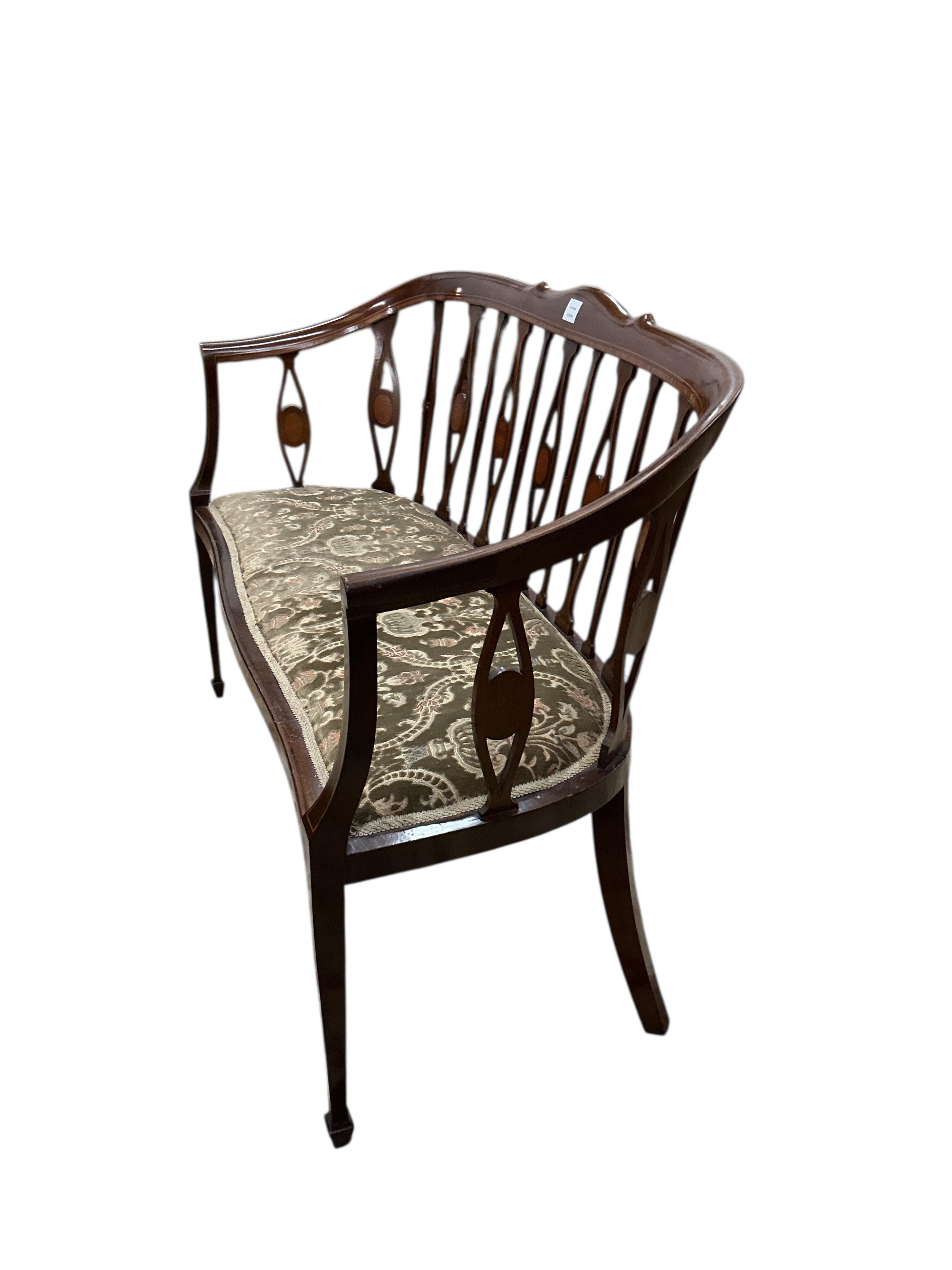 An Edwardian inlaid mahogany settee, width 126cm, depth 48cm, height 88cm